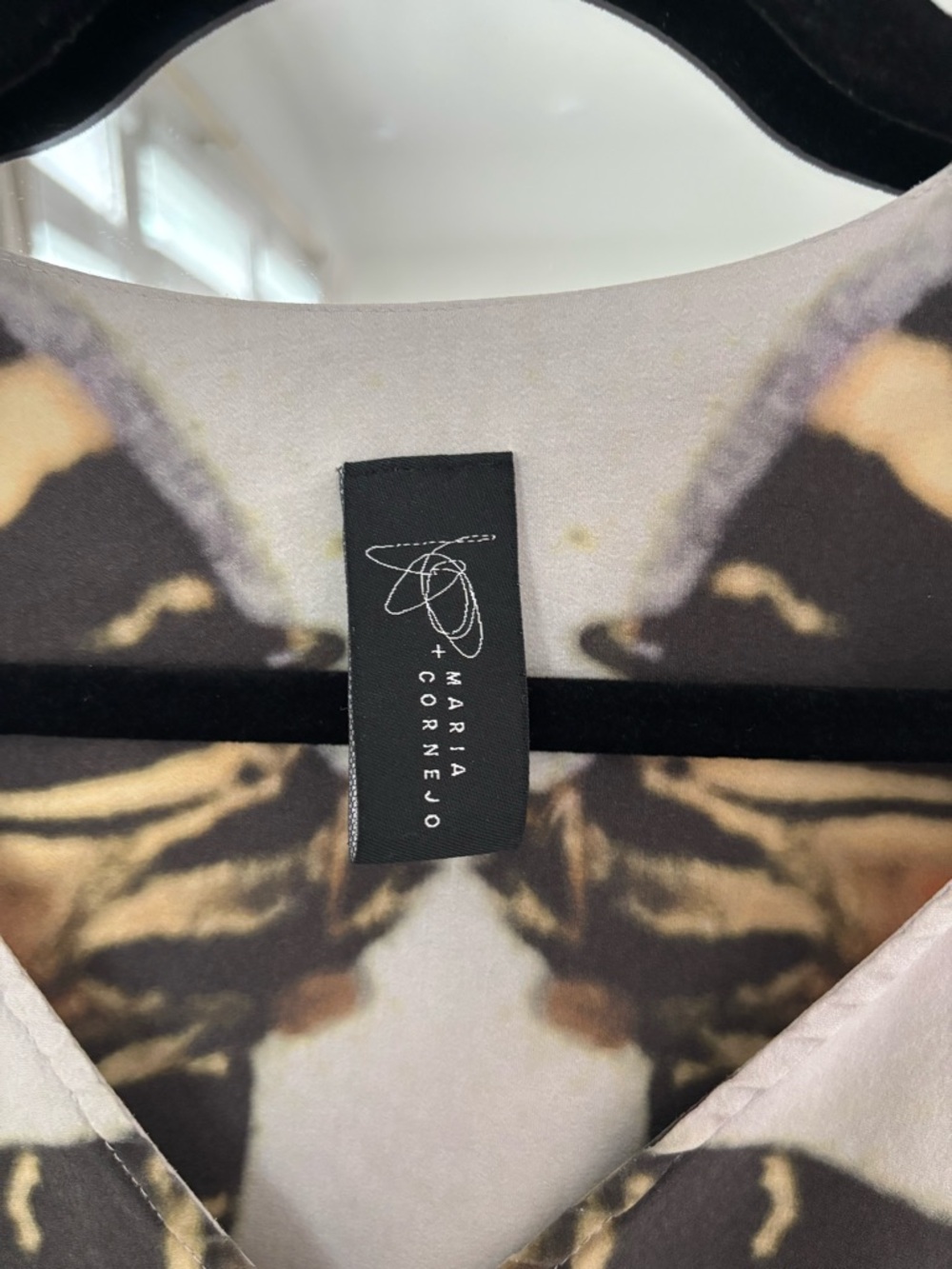 Butterfly Print Sleeveless Top in Orange and Black - Picture 2 of 3